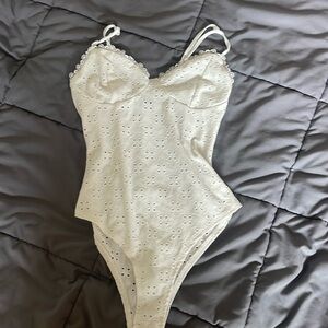 white bodysuit
